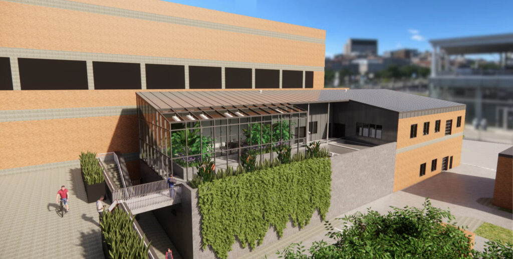 Rendering of the WaterHub® wastewater reuse facility at the Austin Planning and Development Center, showing integrated hydroponic treatment system and pedestrian-friendly design.