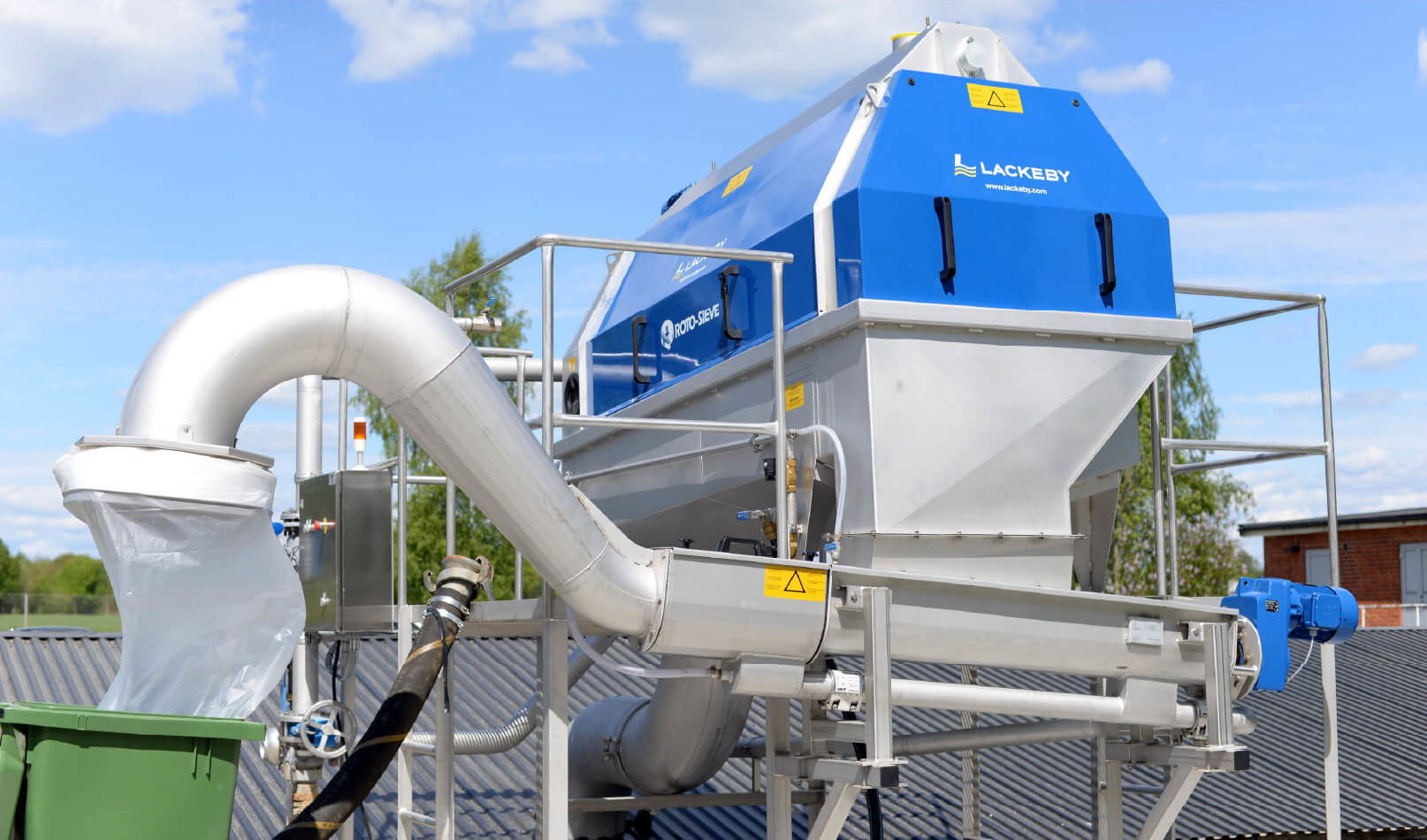 Lackeby Roto-Sieve septage receiving unit with hauler connection and drum screen housing